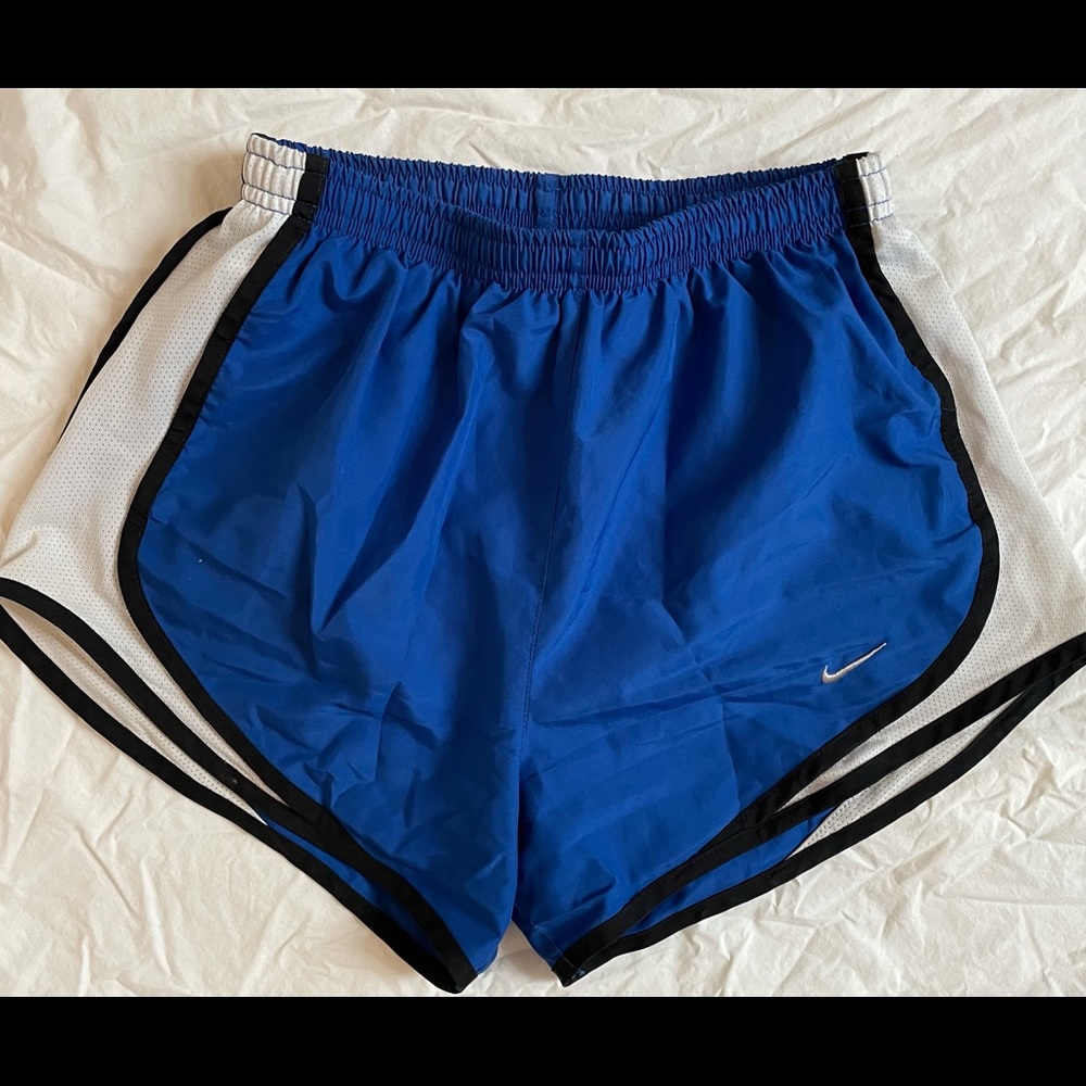 Blue Nike running shorts